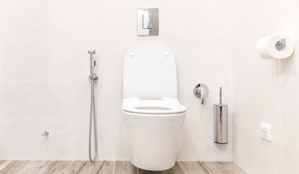 Where to place the toilet brush holder?