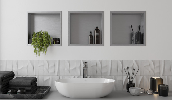 Modern arrangement of the washbasin area with built-in shelves