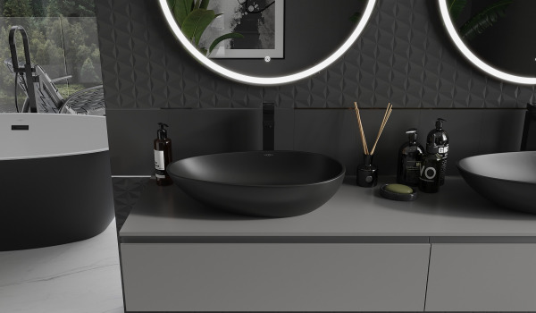 Conglomerate sinks in a gray-black bathroom