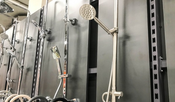 At what height should you install a sliding shower set?